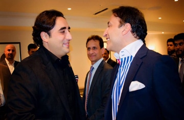 Zahid Mughal presents information booklet to Bilawal Bhutto
