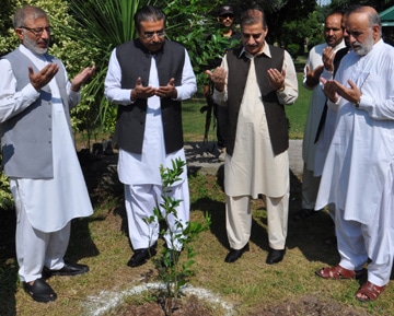 AJK Chief Secretary plants a sapling at Jallabad Garden
