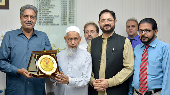 Muhammad Sakhawat receives shield, gift and cheque of dues at farewell party