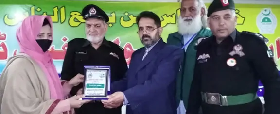 Abdul Rahman addresses event after holding a walk and seminar on occasion of International Defense Day